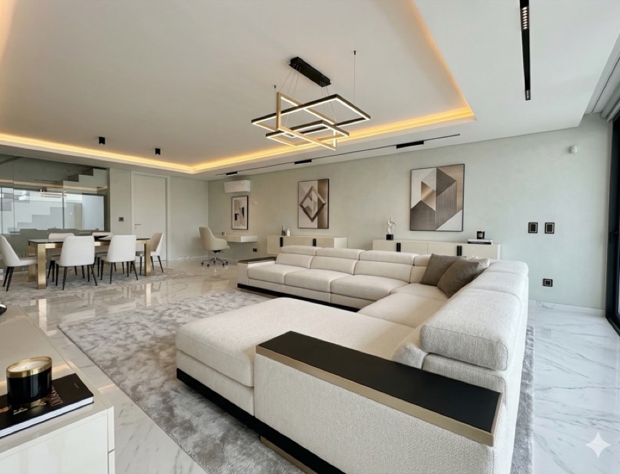 A room restyled in Dubai Luxury design — marble, gold accents, statement lighting.